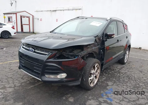2016 Ford Escape Titanium from USA, damaged, VIN 1FMCU9J9XGUA83115